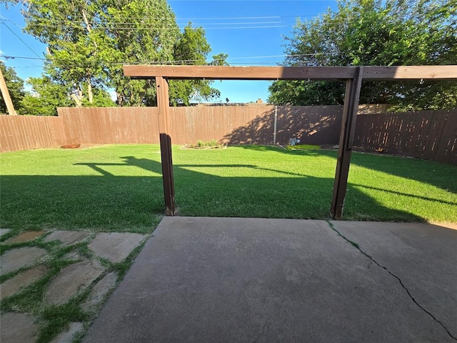 5712 Lawson Ln, Oklahoma City, OK 73132 - fenced backyard with a patio