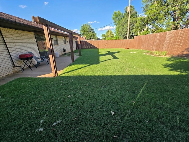 5712 Lawson Ln, Oklahoma City, OK 73132 - fenced backyard with a patio