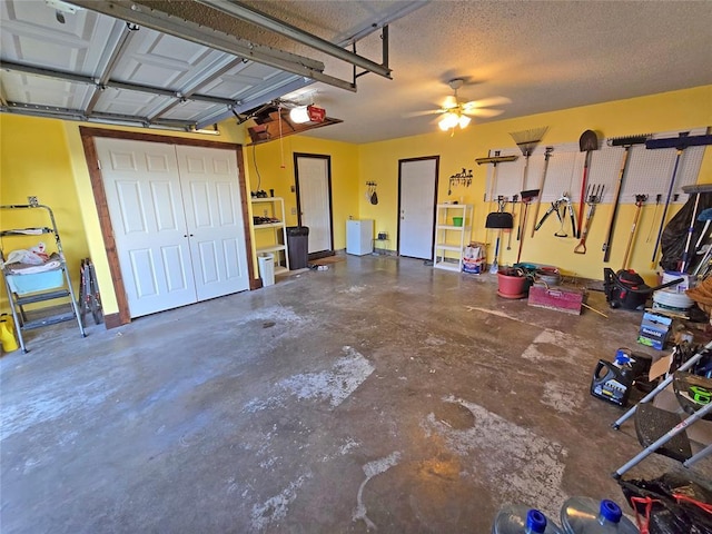 5712 Lawson Ln, Oklahoma City, OK 73132 - garage with a garage door opener and a ceiling fan