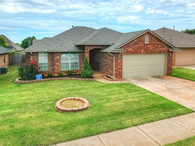 5112 NW 163rd St, Edmond, OK 73013 - view of front facade featuring a shingled roof, a garage, brick siding, and concrete driveway