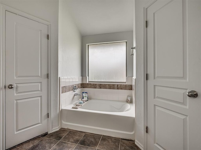 5112 NW 163rd St, Edmond, OK 73013 - bathroom featuring a garden tub and tile patterned flooring