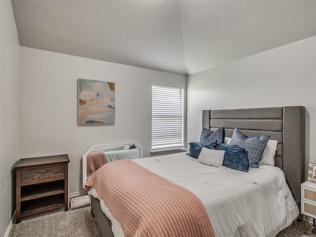 5112 NW 163rd St, Edmond, OK 73013 - carpeted bedroom with vaulted ceiling and baseboards