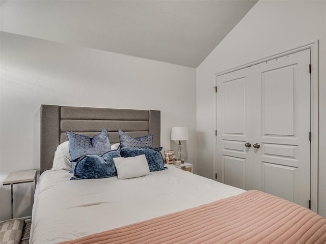 5112 NW 163rd St, Edmond, OK 73013 - bedroom with vaulted ceiling and a closet