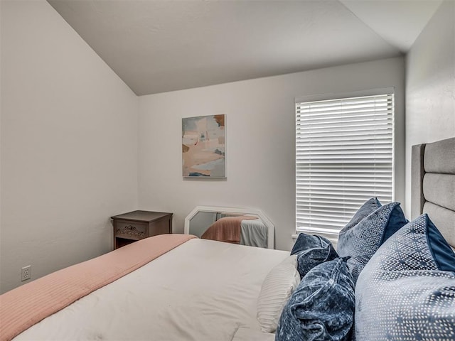 5112 NW 163rd St, Edmond, OK 73013 - bedroom featuring vaulted ceiling