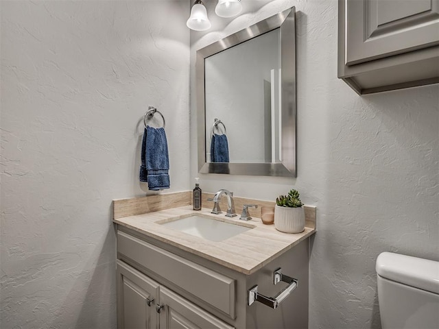 5112 NW 163rd St, Edmond, OK 73013 - half bath with vanity and a textured wall