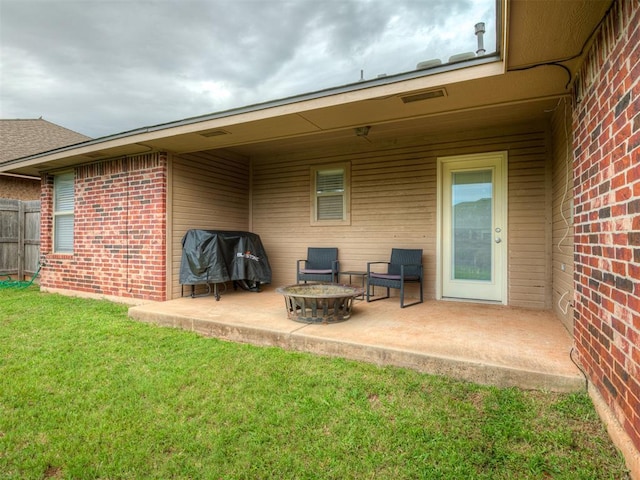 5112 NW 163rd St, Edmond, OK 73013 - view of patio featuring an outdoor fire pit and grilling area