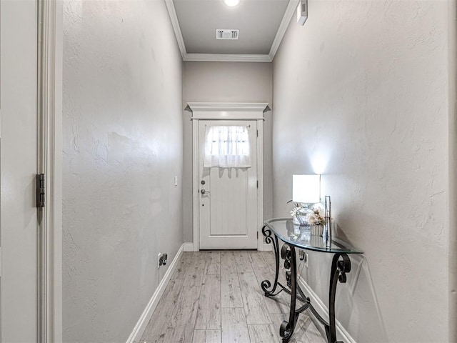 917 NE 34th Ter, Moore, OK 73160 - entryway featuring wood finished floors and crown molding
