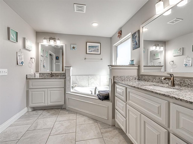 917 NE 34th Ter, Moore, OK 73160 - full bath featuring two vanities and a garden tub