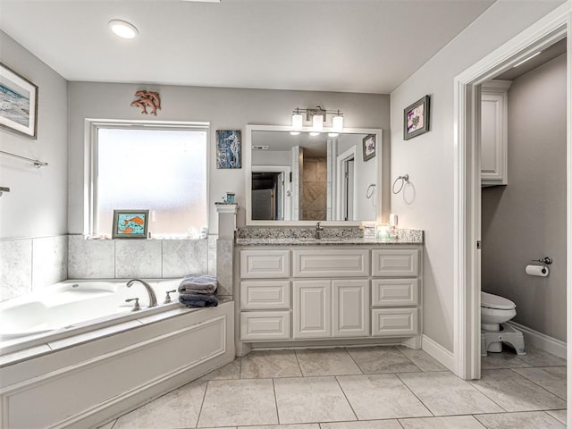 917 NE 34th Ter, Moore, OK 73160 - full bath with vanity, a garden tub, and tile patterned floors
