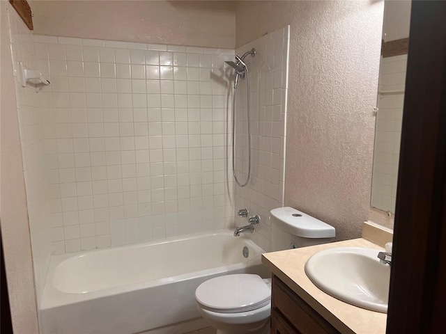 8300 NW 10th St Unit 140, Oklahoma City, OK 73127 - bathroom featuring a textured wall, vanity, and shower / bathtub combination