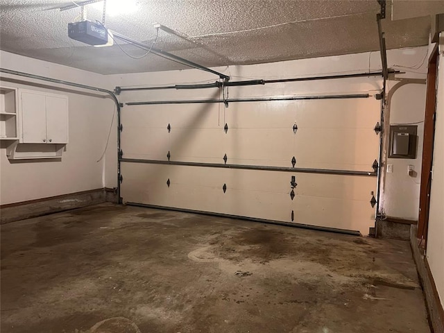 8300 NW 10th St Unit 140, Oklahoma City, OK 73127 - garage with a garage door opener and electric panel