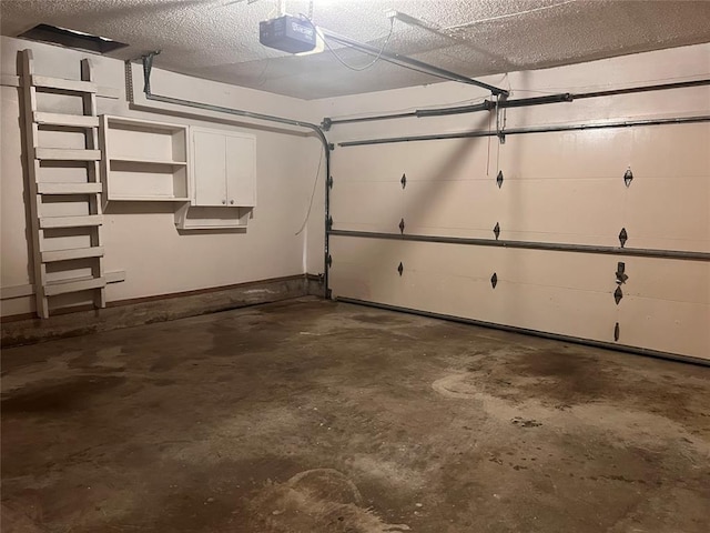 8300 NW 10th St Unit 140, Oklahoma City, OK 73127 - garage featuring a garage door opener