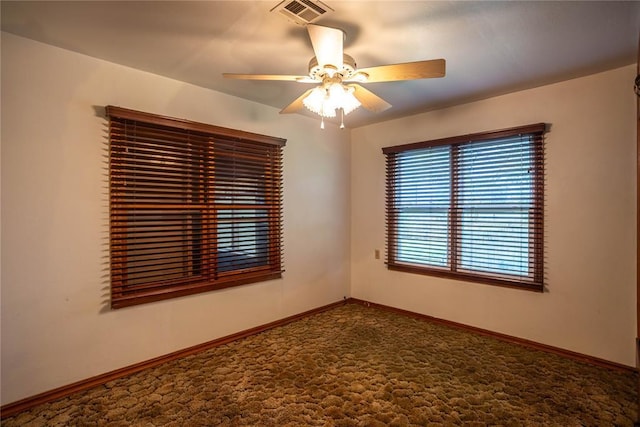 423 N Missouri St, Weatherford, OK 73669 - empty room featuring a ceiling fan and baseboards