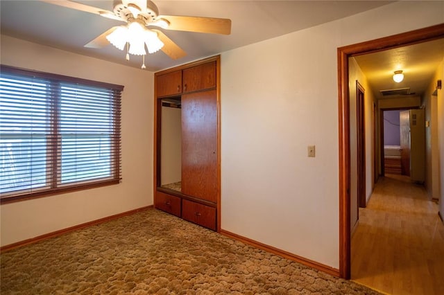 423 N Missouri St, Weatherford, OK 73669 - unfurnished bedroom with a closet and ceiling fan