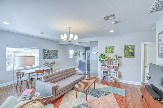 1621 NW 18th St, Oklahoma City, OK 73106 - living room with a chandelier, wood finished floors, and recessed lighting