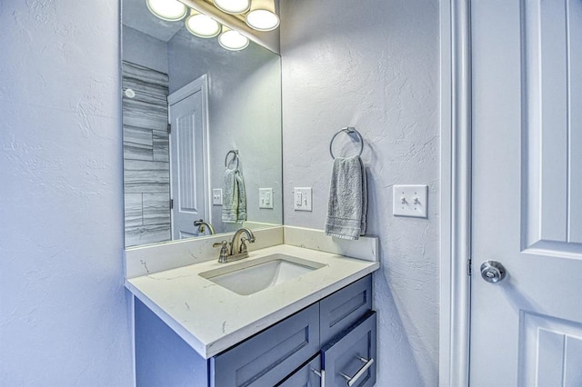 1621 NW 18th St, Oklahoma City, OK 73106 - bathroom with a textured wall and vanity