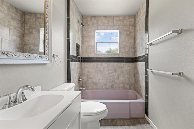 4504 N Grove Ave, Warr Acres, OK 73122 - full bath with bathtub / shower combination, vanity, wood finished floors, and a textured wall