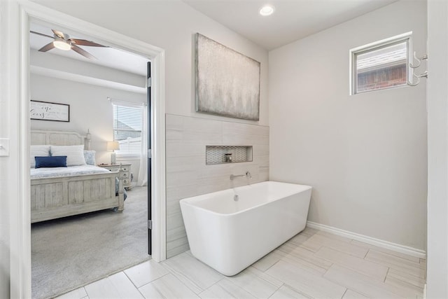 12505 Shady Gln, Choctaw, OK 73020 - full bathroom featuring a freestanding bath, ensuite bath, ceiling fan, and recessed lighting