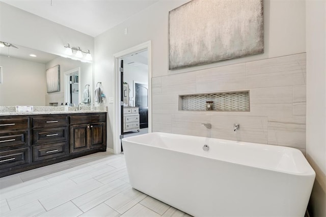 12505 Shady Gln, Choctaw, OK 73020 - full bathroom with a soaking tub and double vanity