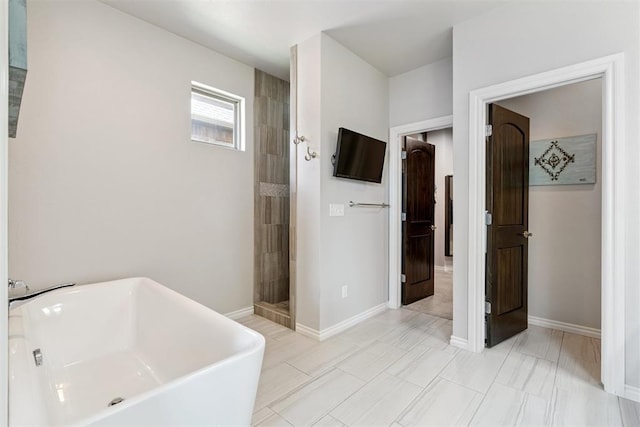 12505 Shady Gln, Choctaw, OK 73020 - bathroom featuring a soaking tub and tiled shower