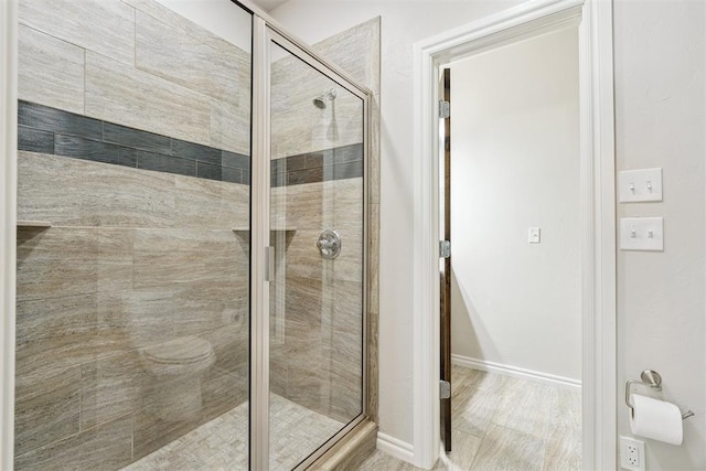 12505 Shady Gln, Choctaw, OK 73020 - bathroom featuring a shower stall and baseboards