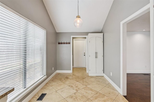 2416 Chimney Hill Ct, Edmond, OK 73034 - unfurnished bedroom with baseboards and vaulted ceiling
