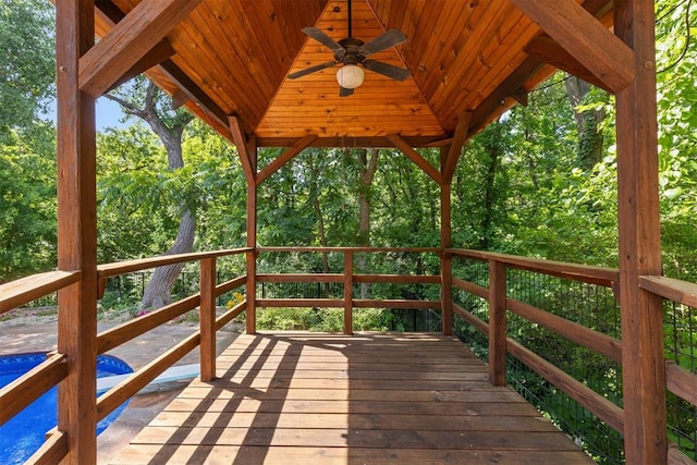 4225 Red Bud Pl, Edmond, OK 73013 - wooden terrace with a ceiling fan and a gazebo