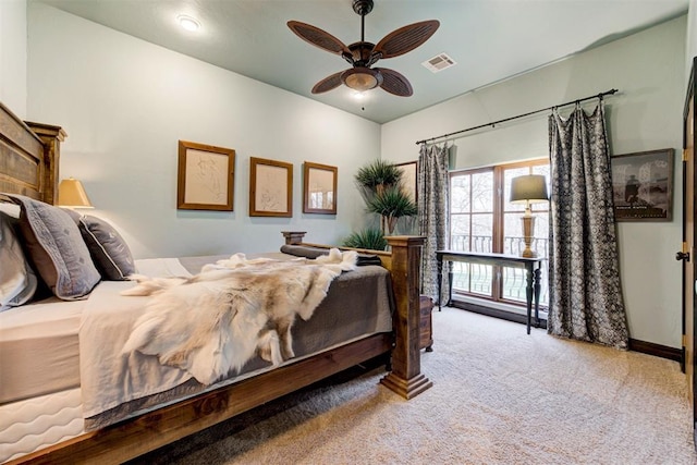 4225 Red Bud Pl, Edmond, OK 73013 - bedroom with carpet and ceiling fan