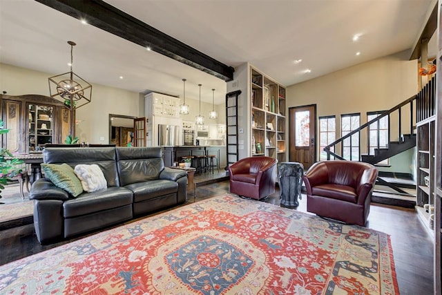 4225 Red Bud Pl, Edmond, OK 73013 - living area with beamed ceiling, wood finished floors, stairway, a chandelier, and recessed lighting