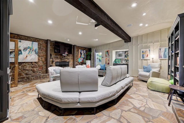 4225 Red Bud Pl, Edmond, OK 73013 - living room featuring recessed lighting and stone floors