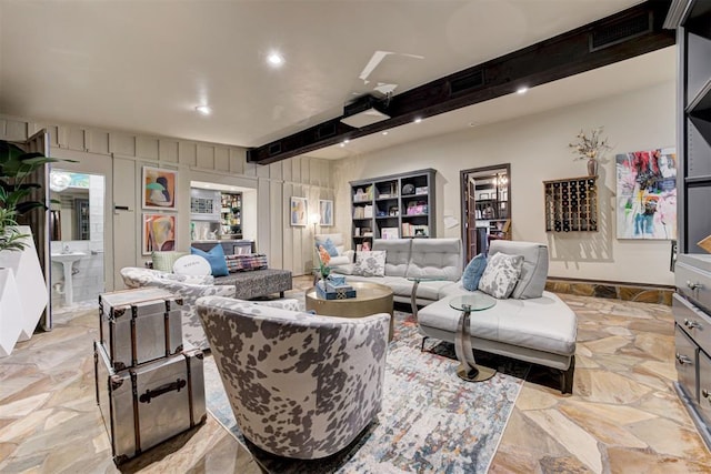 4225 Red Bud Pl, Edmond, OK 73013 - living area with light stone finish floors, recessed lighting, and beamed ceiling
