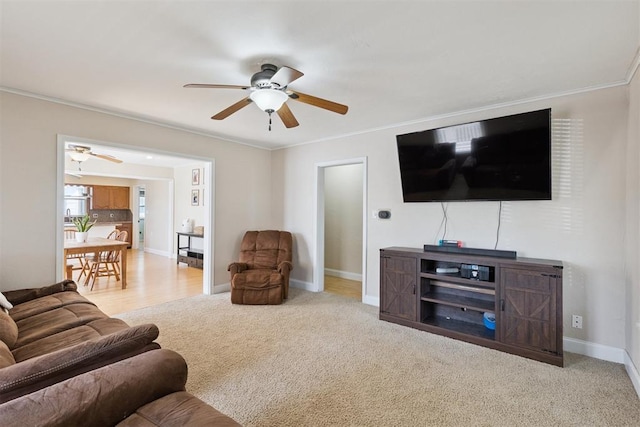 1623 W Washington Ave, Guthrie, OK 73044 - living area featuring ceiling fan, ornamental molding, and carpet flooring