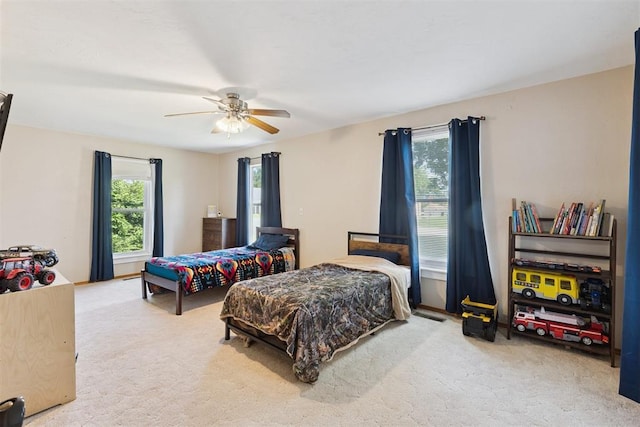 1623 W Washington Ave, Guthrie, OK 73044 - carpeted bedroom with ceiling fan