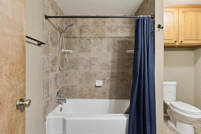 1623 W Washington Ave, Guthrie, OK 73044 - bathroom featuring toilet and shower / tub combo with curtain