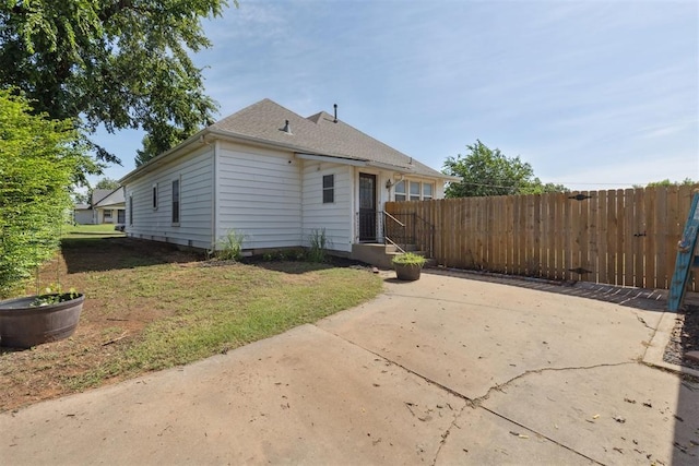 1623 W Washington Ave, Guthrie, OK 73044 - back of house featuring a patio