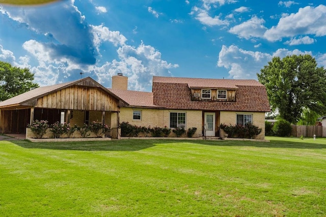 503 N Sheb Wooley Ave, Erick, OK 73645 - dutch colonial featuring a chimney and brick siding
