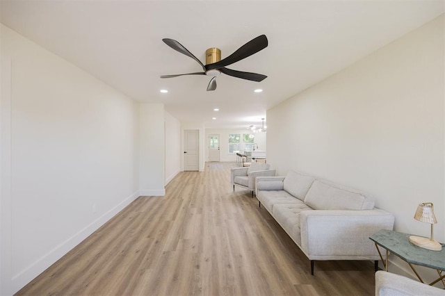 2020 Hasley Dr, The Village, OK 73120 - living room with light wood finished floors, recessed lighting, and ceiling fan
