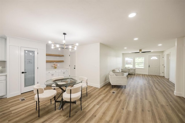 2020 Hasley Dr, The Village, OK 73120 - dining area featuring light wood finished floors, recessed lighting, and a chandelier
