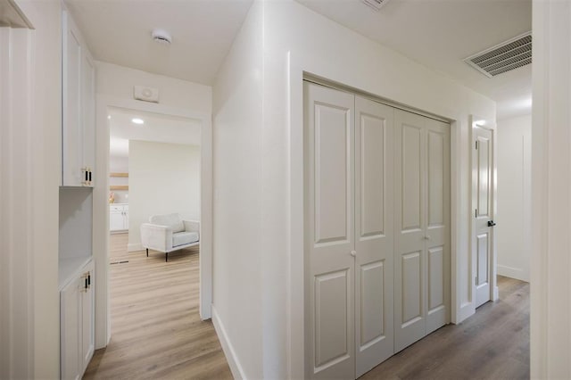 2020 Hasley Dr, The Village, OK 73120 - hall with light wood finished floors and baseboards