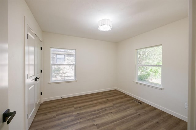 2020 Hasley Dr, The Village, OK 73120 - unfurnished room featuring wood finished floors and baseboards