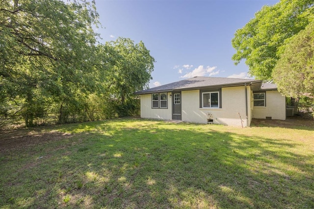 2020 Hasley Dr, The Village, OK 73120 - rear view of house featuring a yard and brick siding