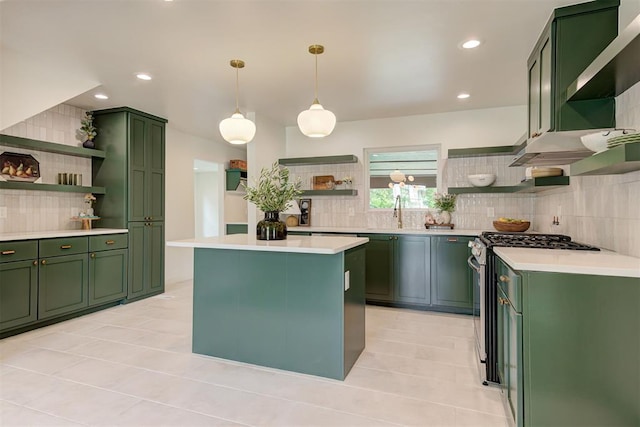 2836 NW 43rd St, Oklahoma City, OK 73112 - kitchen with open shelves, green cabinets, stainless steel range with gas cooktop, and recessed lighting