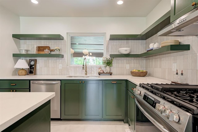 2836 NW 43rd St, Oklahoma City, OK 73112 - kitchen featuring green cabinetry, open shelves, stainless steel appliances, and recessed lighting