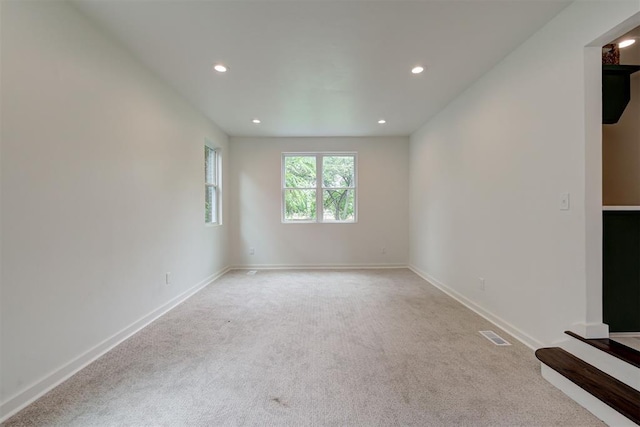 2836 NW 43rd St, Oklahoma City, OK 73112 - empty room featuring light colored carpet and recessed lighting