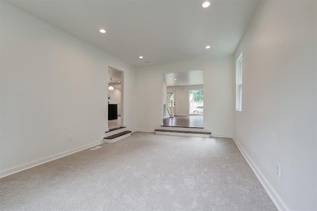 2836 NW 43rd St, Oklahoma City, OK 73112 - unfurnished living room with recessed lighting and carpet