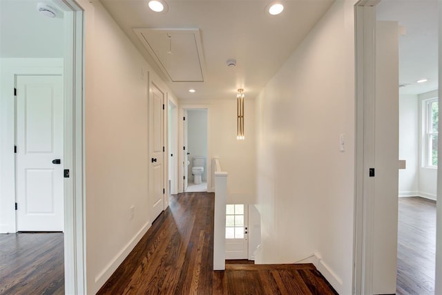 2836 NW 43rd St, Oklahoma City, OK 73112 - corridor with attic access, dark wood-style floors, recessed lighting, and an upstairs landing