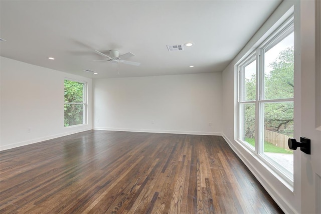 2836 NW 43rd St, Oklahoma City, OK 73112 - empty room with plenty of natural light, dark wood-type flooring, recessed lighting, and ceiling fan