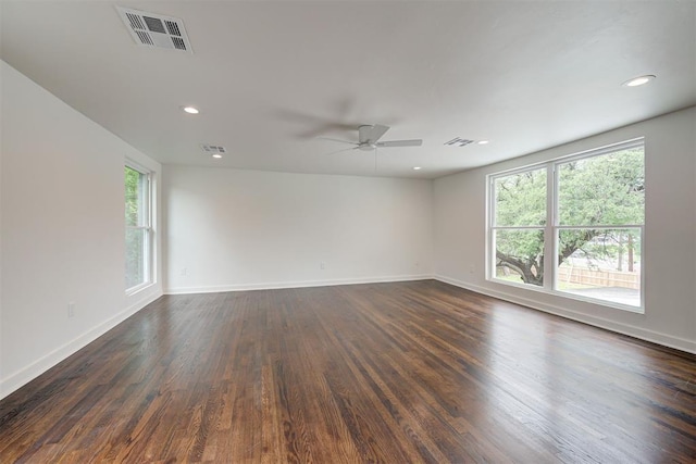 2836 NW 43rd St, Oklahoma City, OK 73112 - unfurnished room with a ceiling fan, dark wood-type flooring, and recessed lighting