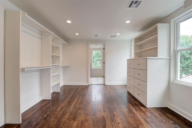 2836 NW 43rd St, Oklahoma City, OK 73112 - walk in closet featuring dark wood-type flooring