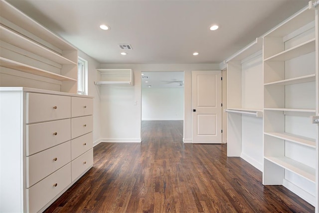 2836 NW 43rd St, Oklahoma City, OK 73112 - walk in closet with dark wood-type flooring